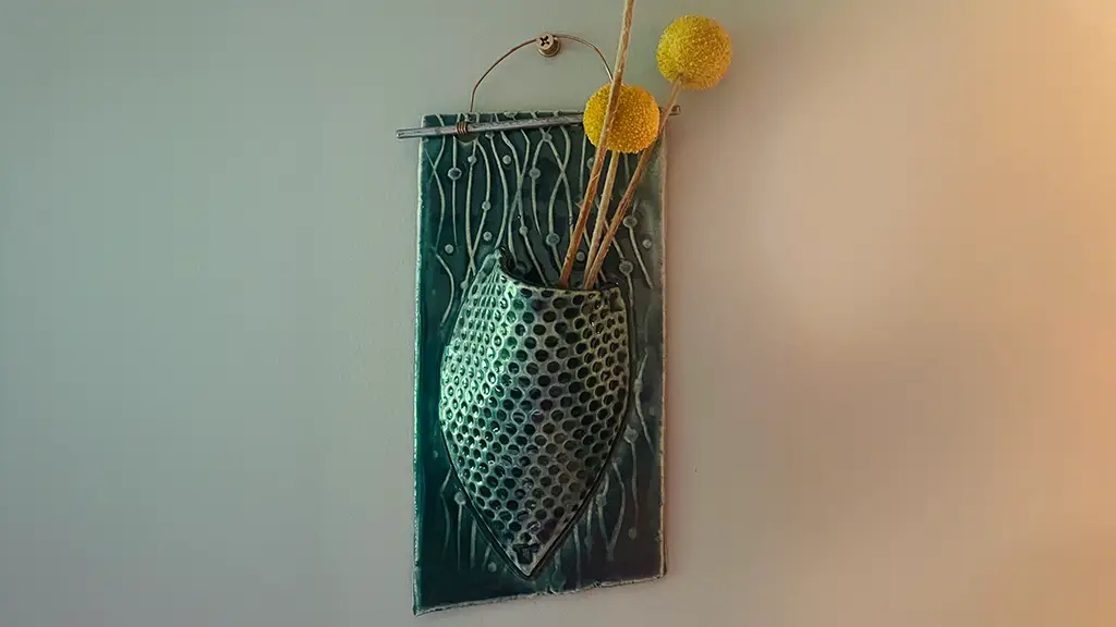 Handbuilt ceramic wall hanging artwork created using advanced slab construction techniques.